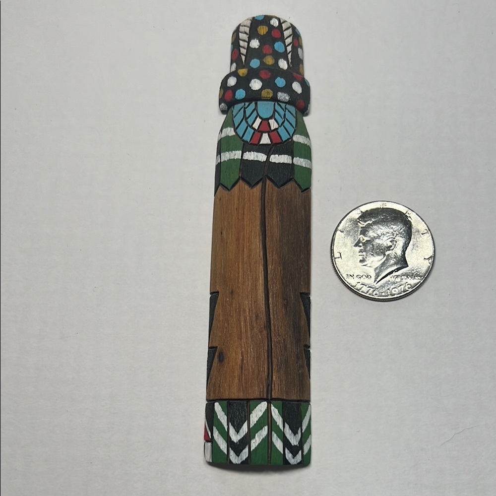 Handcrafted Wooden Kachina magnet with Colorful Accents.